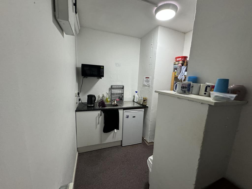 Lot: 146 - MIXED USE INVESTMENT WITH HIGH YIELD - View of the commercial staff room